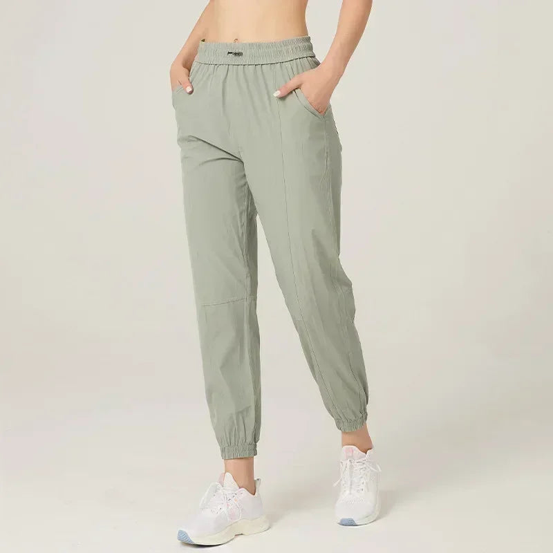 Pantalones deportivos de tela con cordón para correr, de secado rápido, para mujer, para gimnasio, fitness, con bolsillos laterales, para hacer ejercicio.