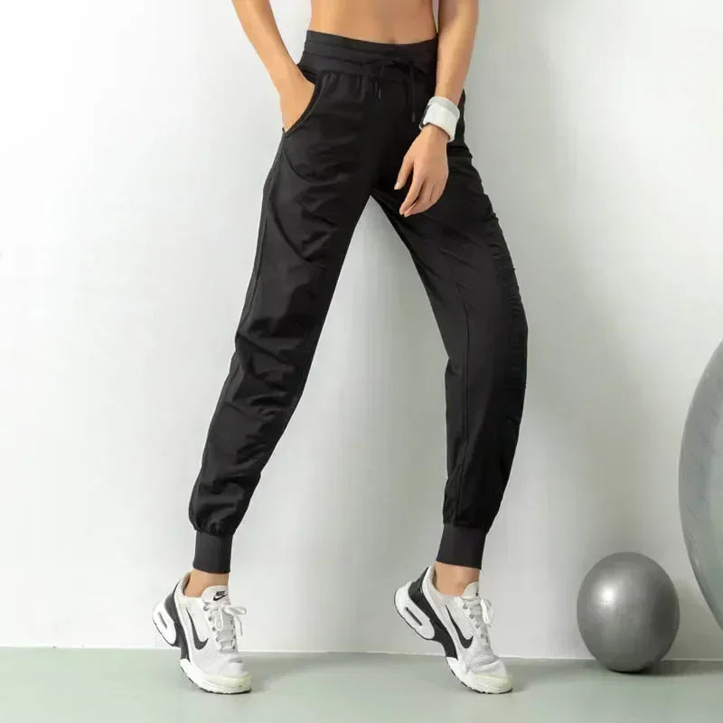 Pantalones deportivos de tela con cordón para correr, de secado rápido, para mujer, para gimnasio, fitness, con bolsillos laterales, para hacer ejercicio.