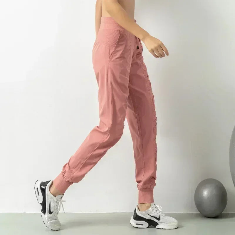 Pantalones deportivos de tela con cordón para correr, de secado rápido, para mujer, para gimnasio, fitness, con bolsillos laterales, para hacer ejercicio.