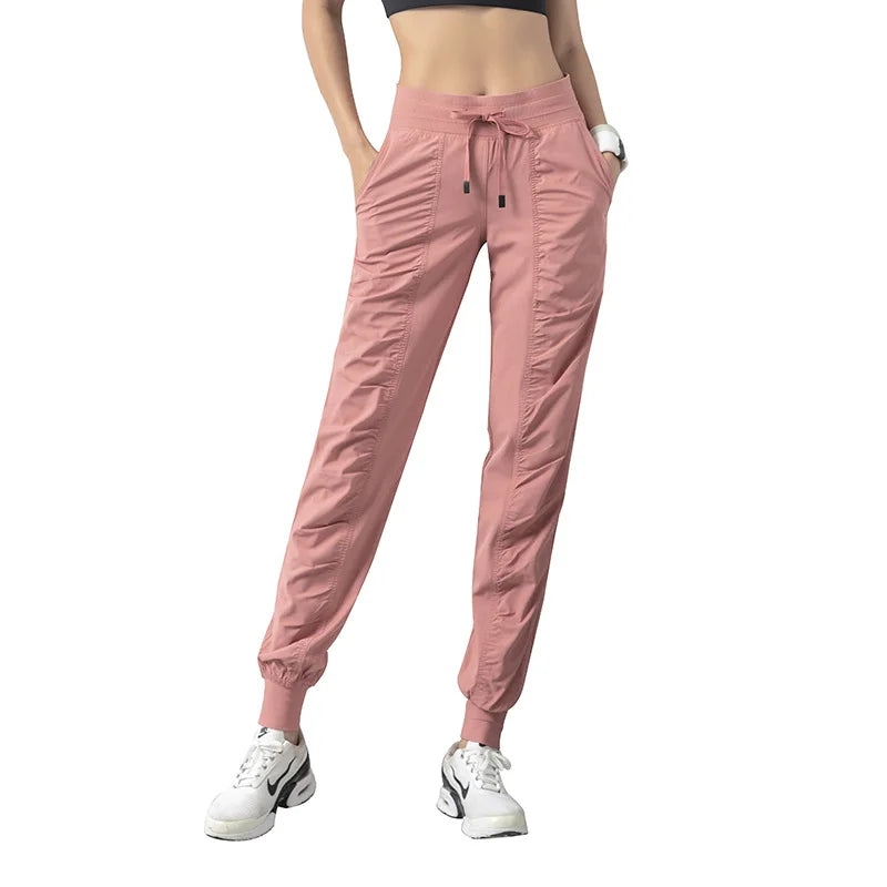 Pantalones deportivos de tela con cordón para correr, de secado rápido, para mujer, para gimnasio, fitness, con bolsillos laterales, para hacer ejercicio.