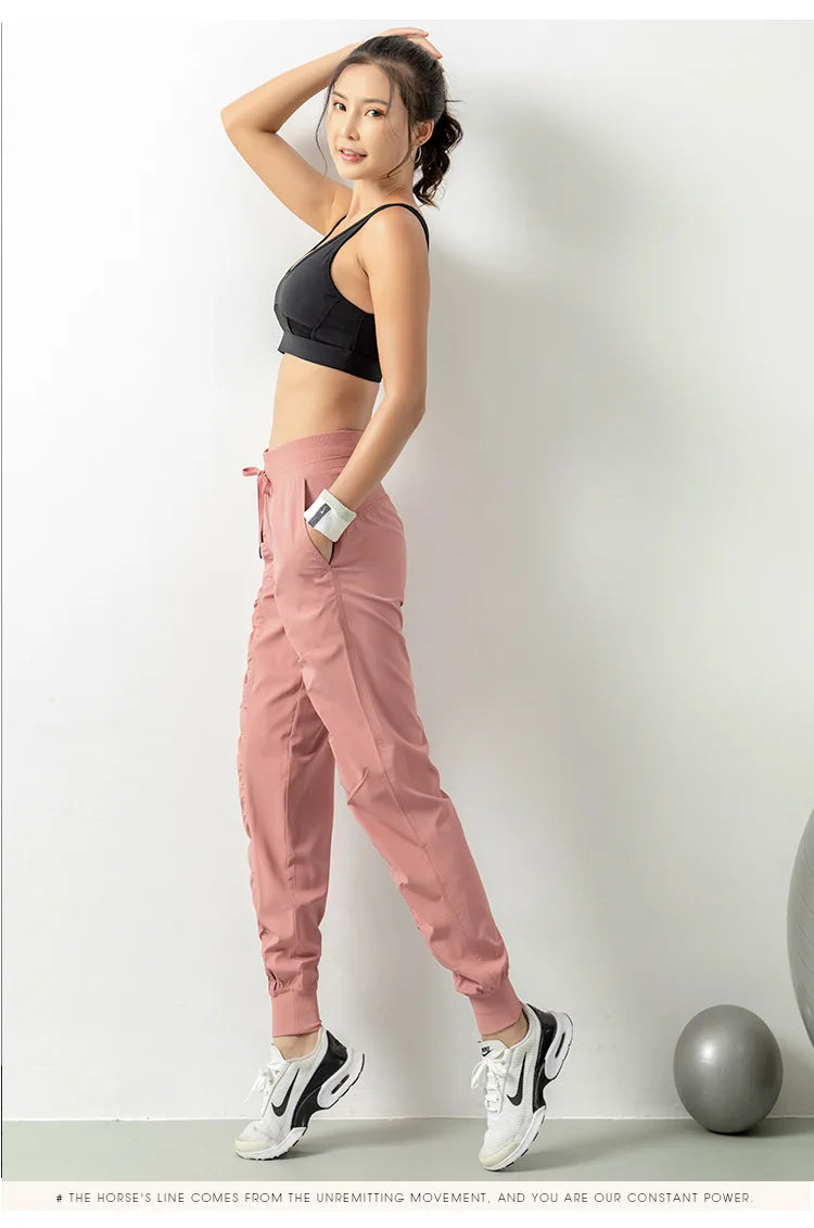 Pantalones deportivos de tela con cordón para correr, de secado rápido, para mujer, para gimnasio, fitness, con bolsillos laterales, para hacer ejercicio.